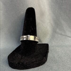 Silver and diamond puzzle Ring